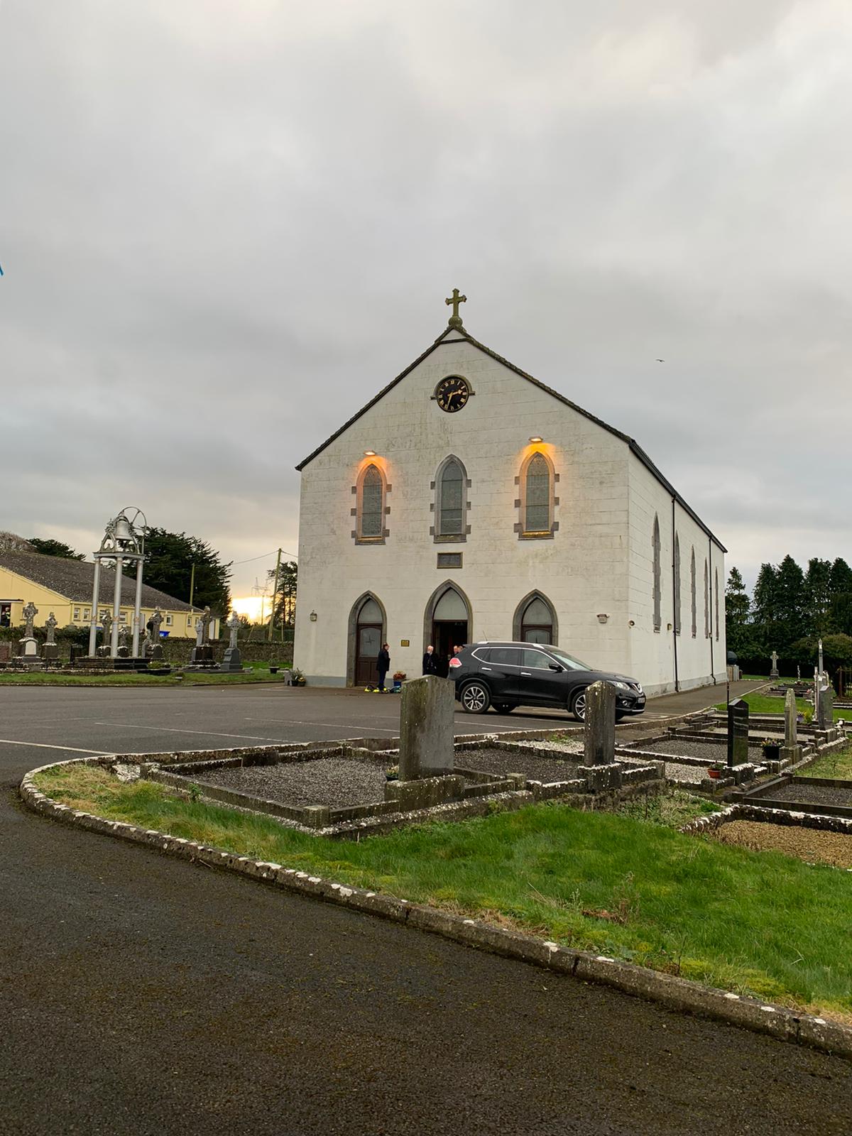 Mourners arrive at St Brigid's Church in Mountbolus, Co Offaly.