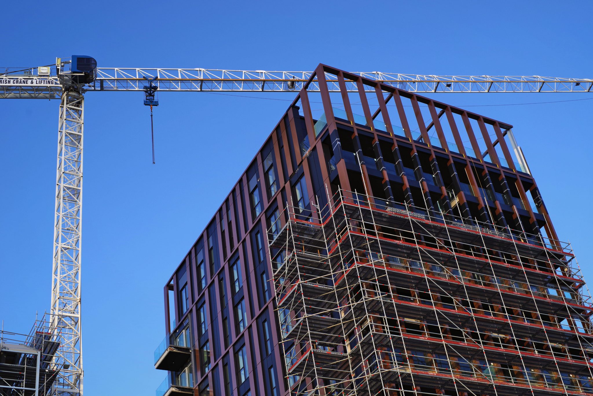 A low-angle shot of building construction in Dublin's Docklands in October 2019.