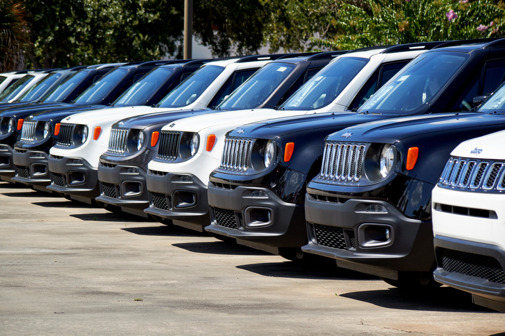 Jeep SUVs are seen on a car sales lot in July 2019