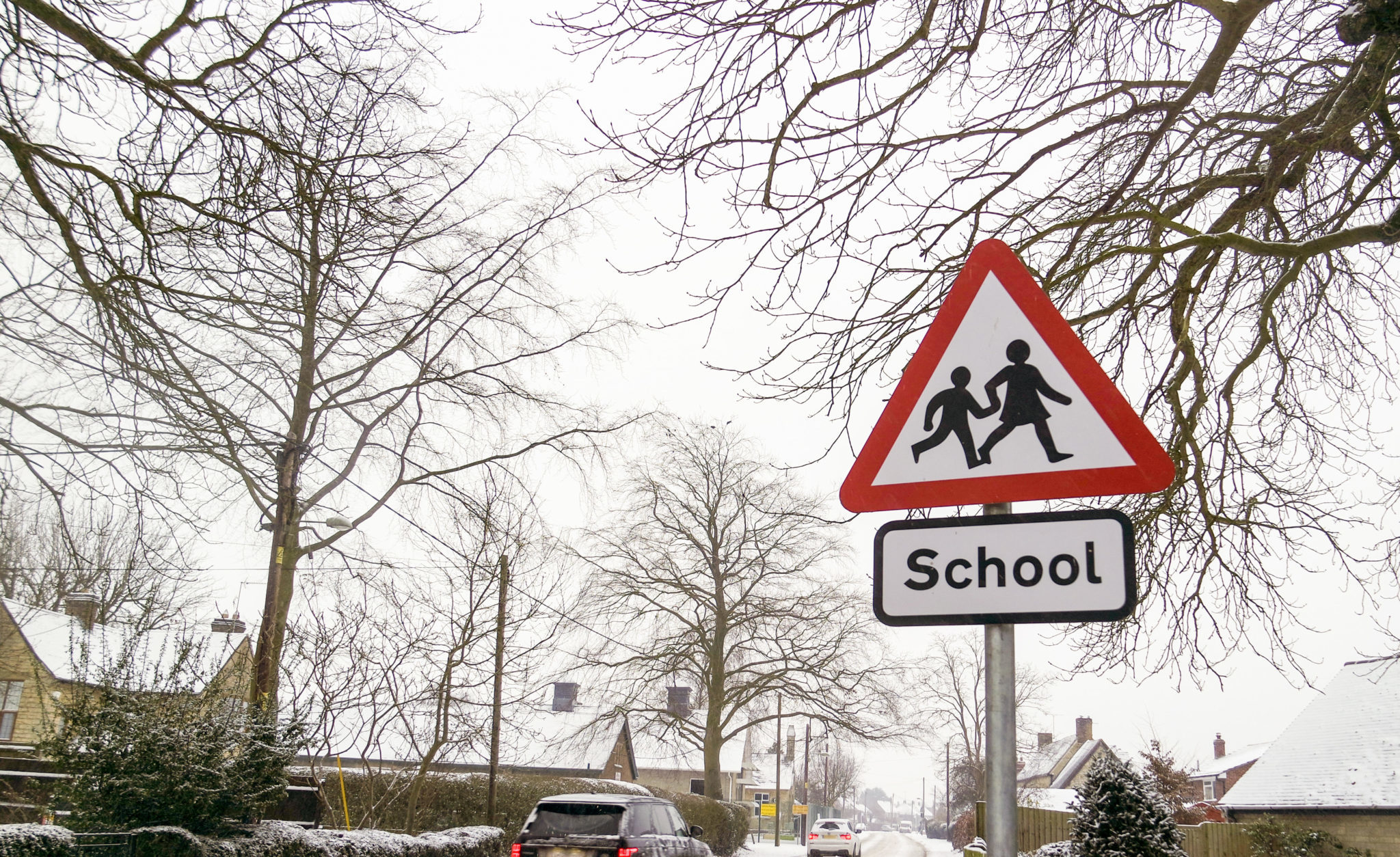 File photo shows a school sign