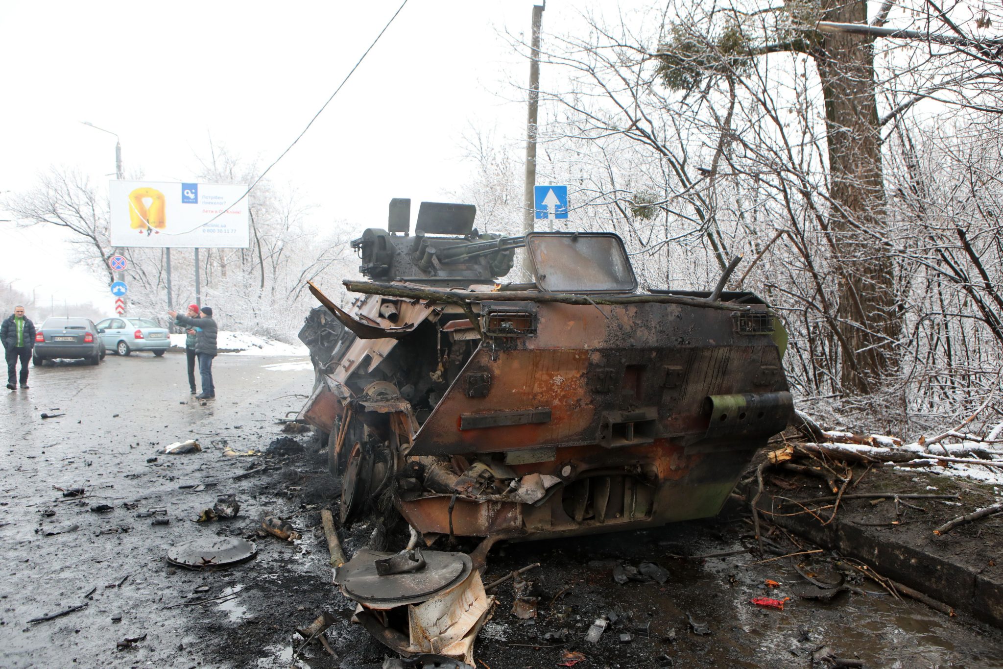 A damaged military vehicle is pictured on the outskirts of Kharkiv, northeastern Ukraine