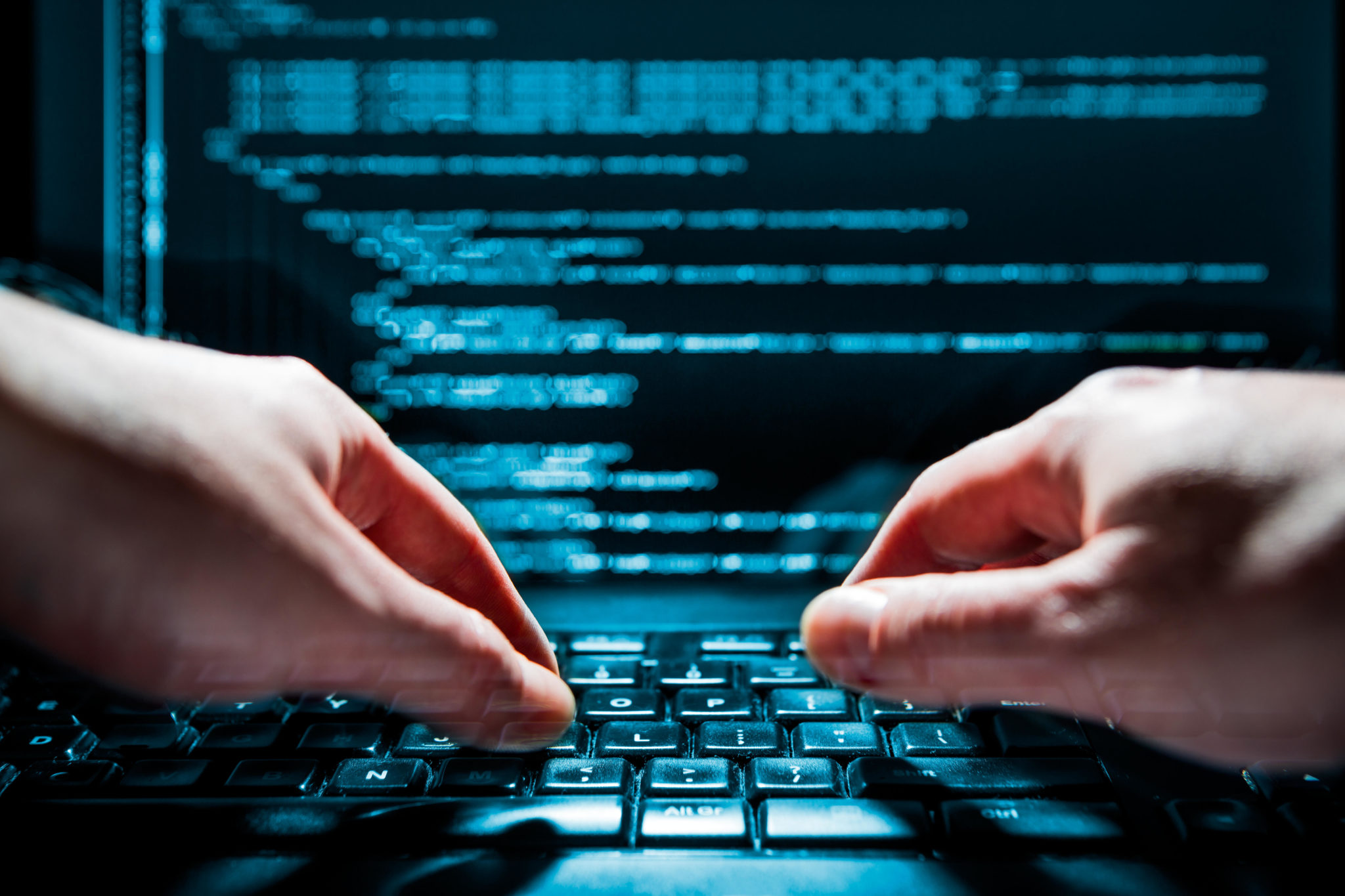 A hacker using a laptop, 19-12-13.