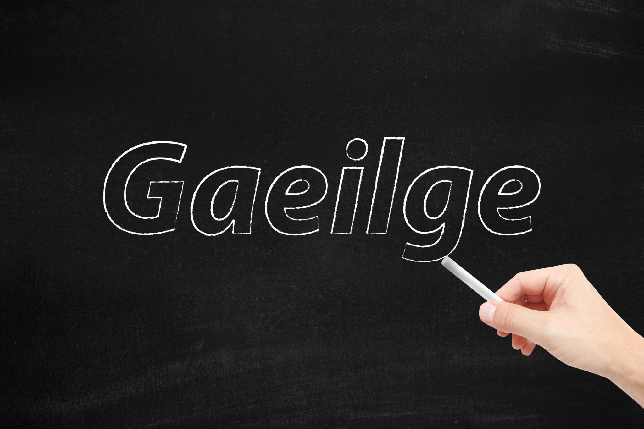 G0X2AN The language of Gaeilge written on a blackboard