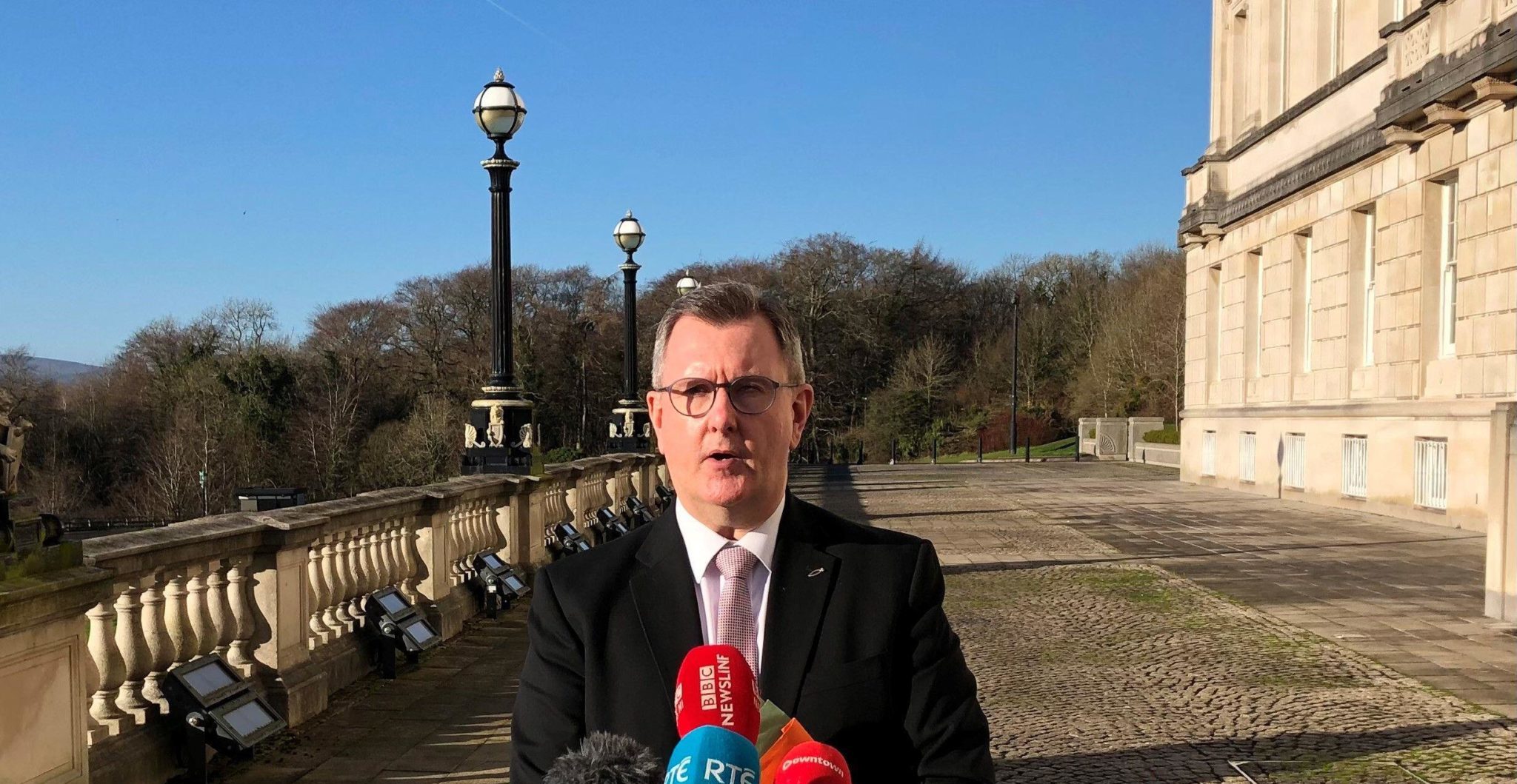 DUP leader Jeffrey Donaldson speaks to the media outside Parliament Buildings in Stormont, Northern Ireland