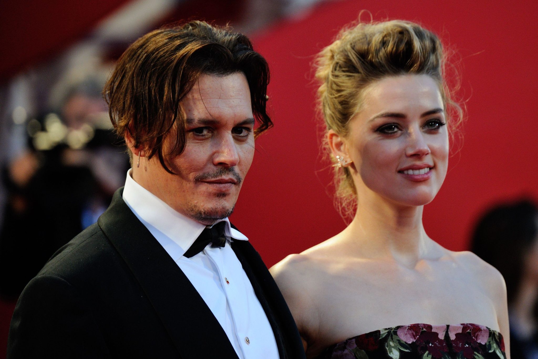 Johnny Depp and Amber Heard attend The Danish Girl premiere as part of the 72nd Venice International Film Festival in Venice, Italy in September 2015.