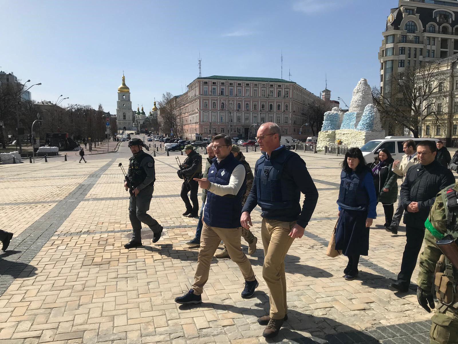 Foreign Affairs Minister Simon Coveney and Ukraine Foreign Affairs Minister Dmytro Kuleba walking towards a memorial wall in Kyiv, 14-04-2022. Image: Irish Eye/Alamy Live News