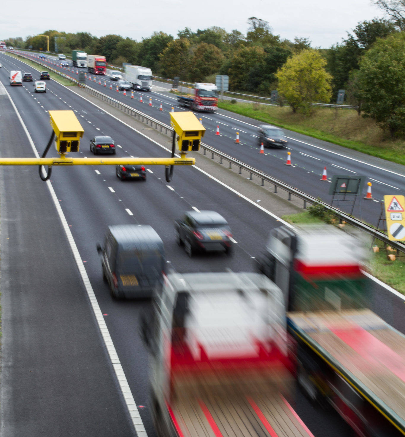 Speed cameras in an average speed check area are seen on a motorway in Britain in October 2017.