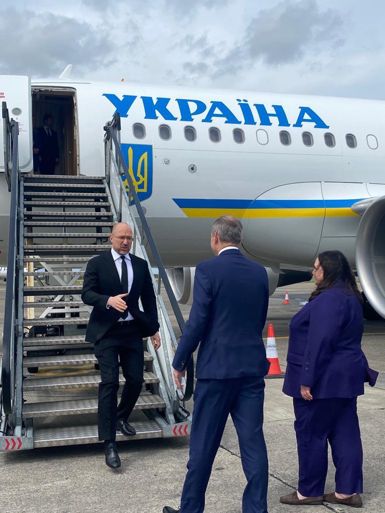 Ukrainian Prime Minister Denys Shmyhal and Taoiseach Micheál Martin greet each other at Shannon Airport. 