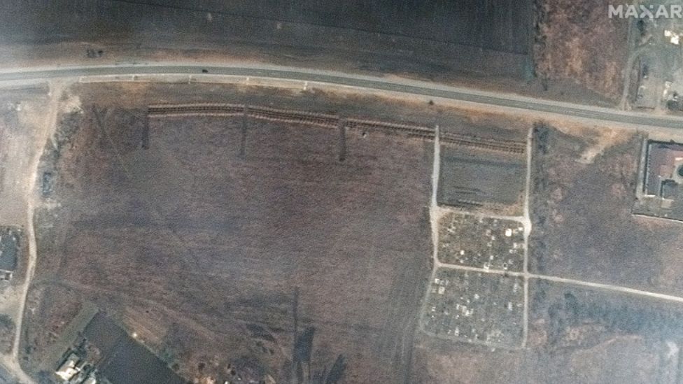 Satellite images showing mass graves in Manhush near the city of Mariupol. Image: Maxar