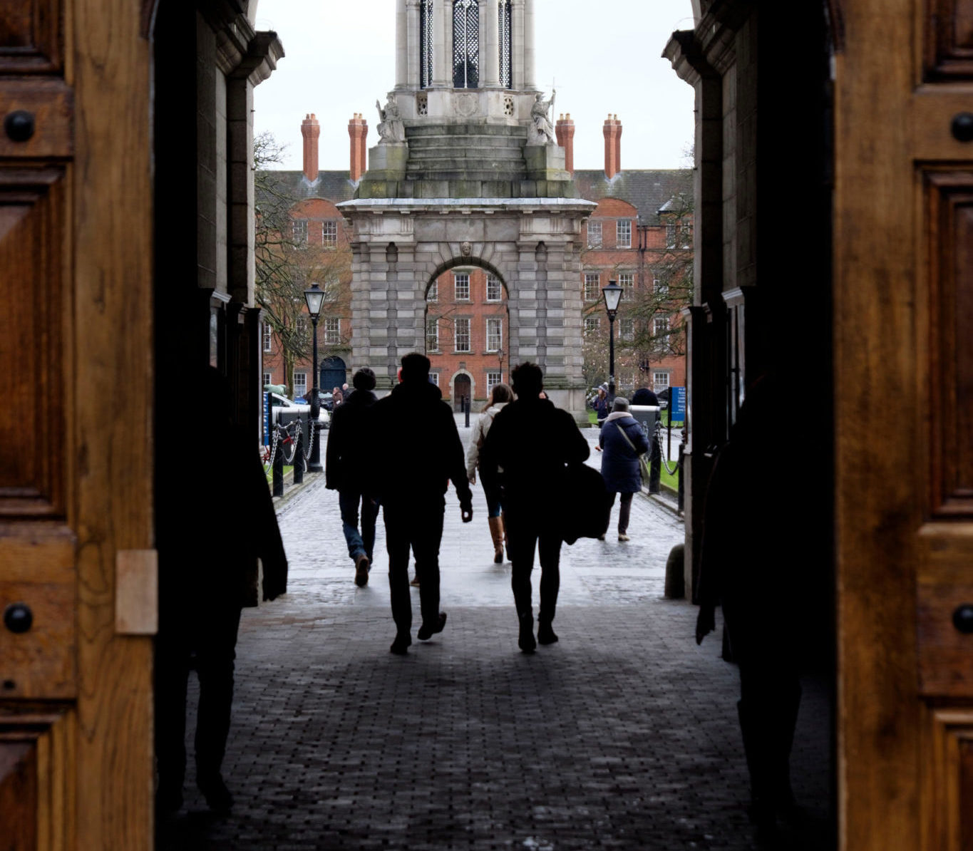 Students are seen on the campus of Trinity College Dublin in March 2016