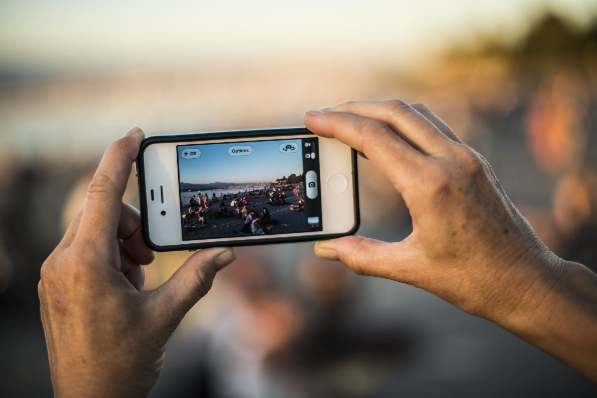 A woman with a camera phone