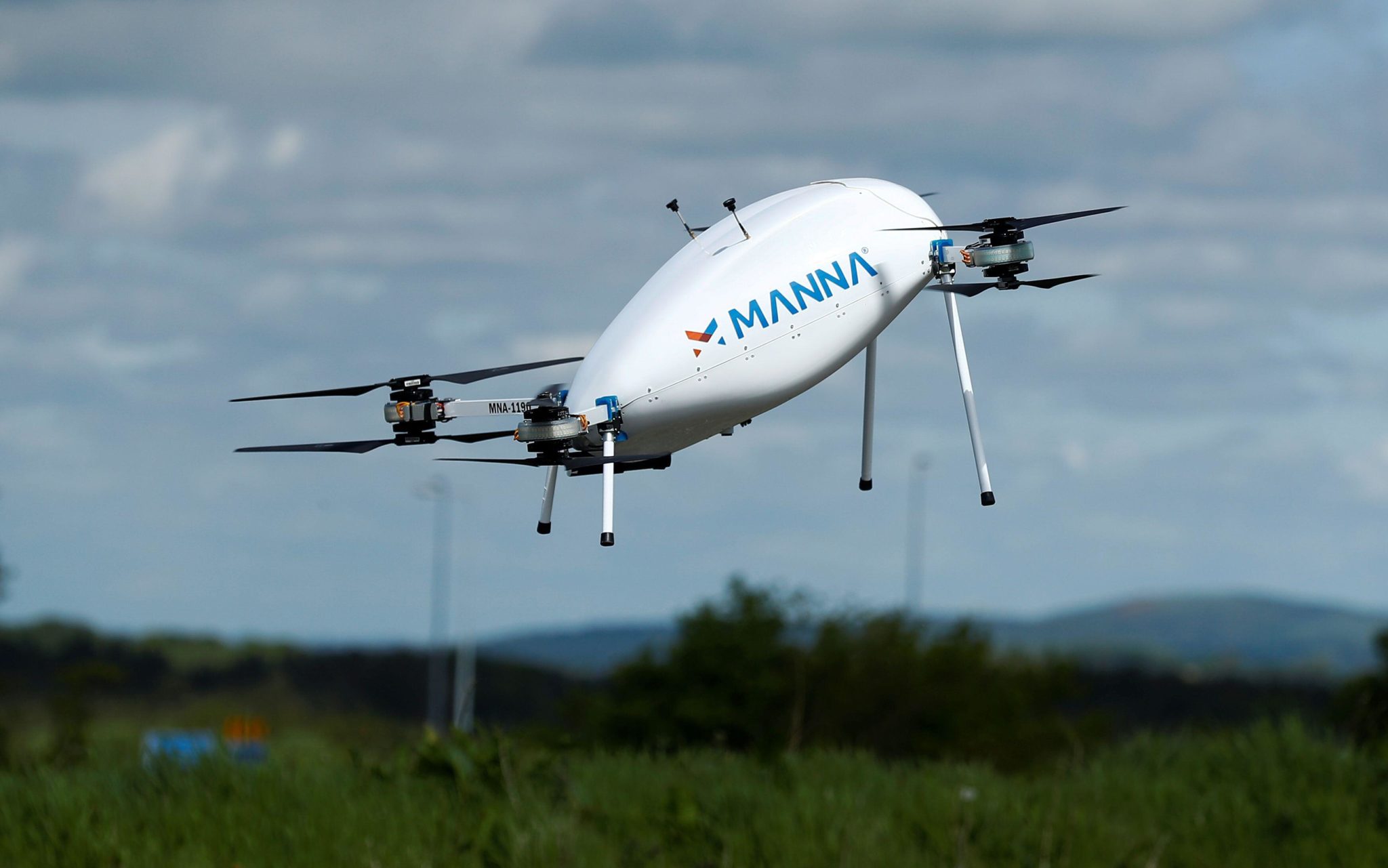 A Manna Aero drone is seen as it delivers essential household and medical supplies in the village of Moneygall, Offaly. Image: REUTERS / Alamy Stock Photo