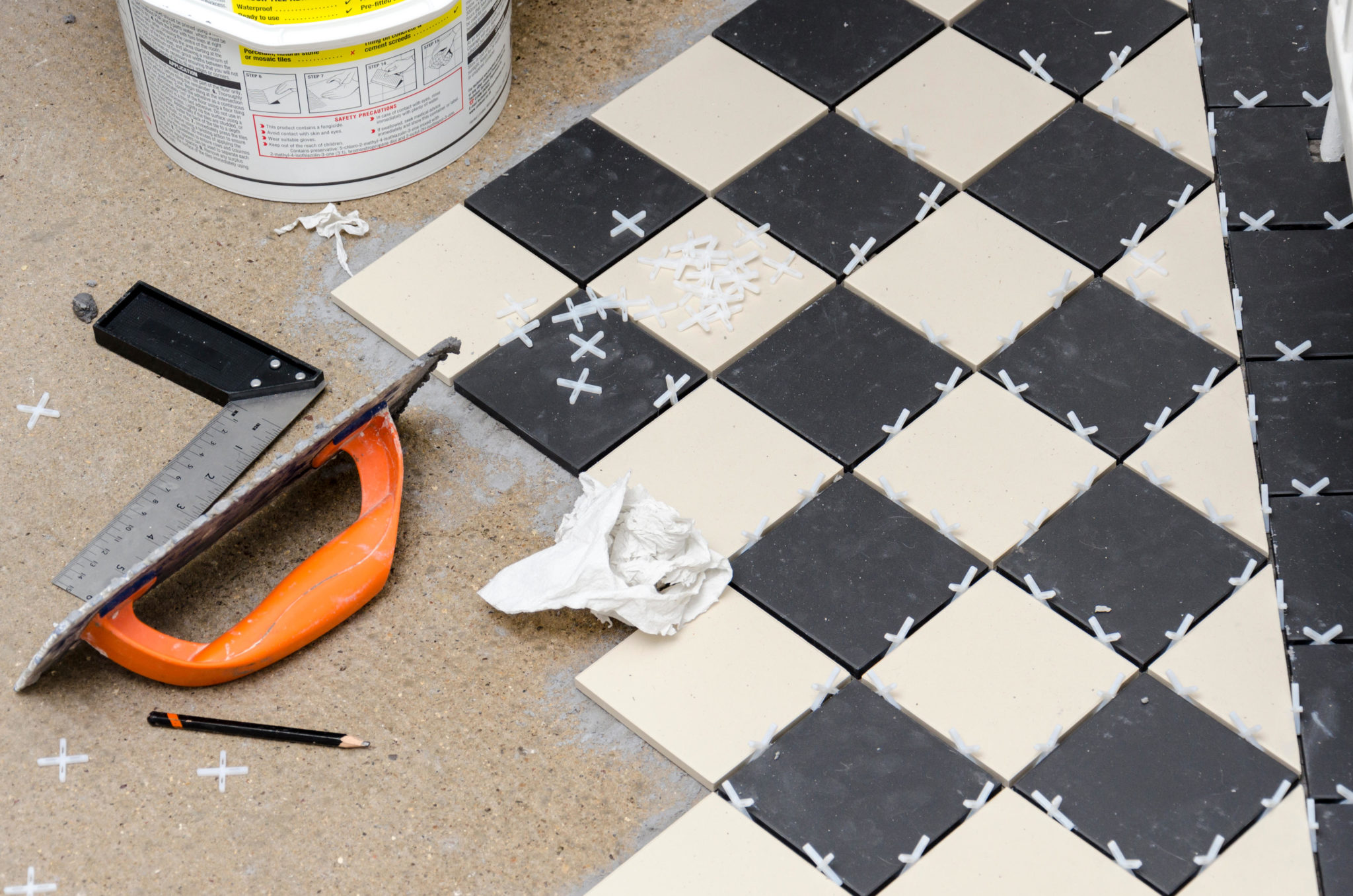 A DIY laying of a tile floor. 