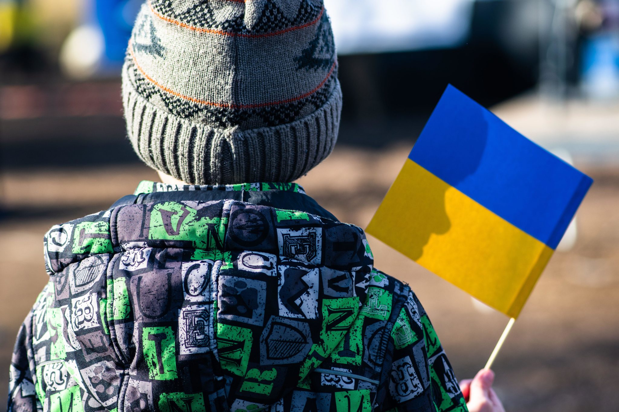 A child is seen with a Ukrainian flag in Vilnius, Lithuania.