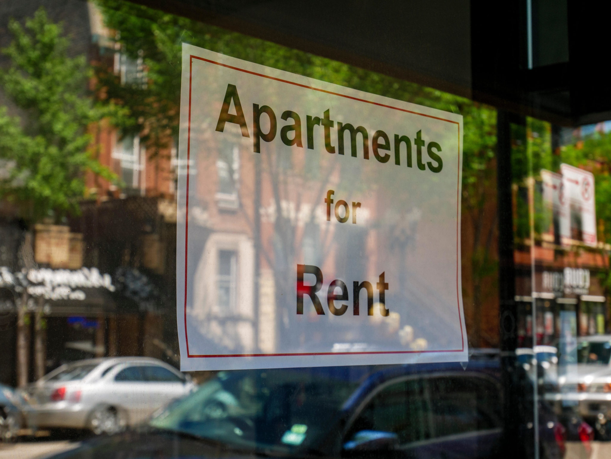An 'Apartments for Rent' sign is seen in June 2019