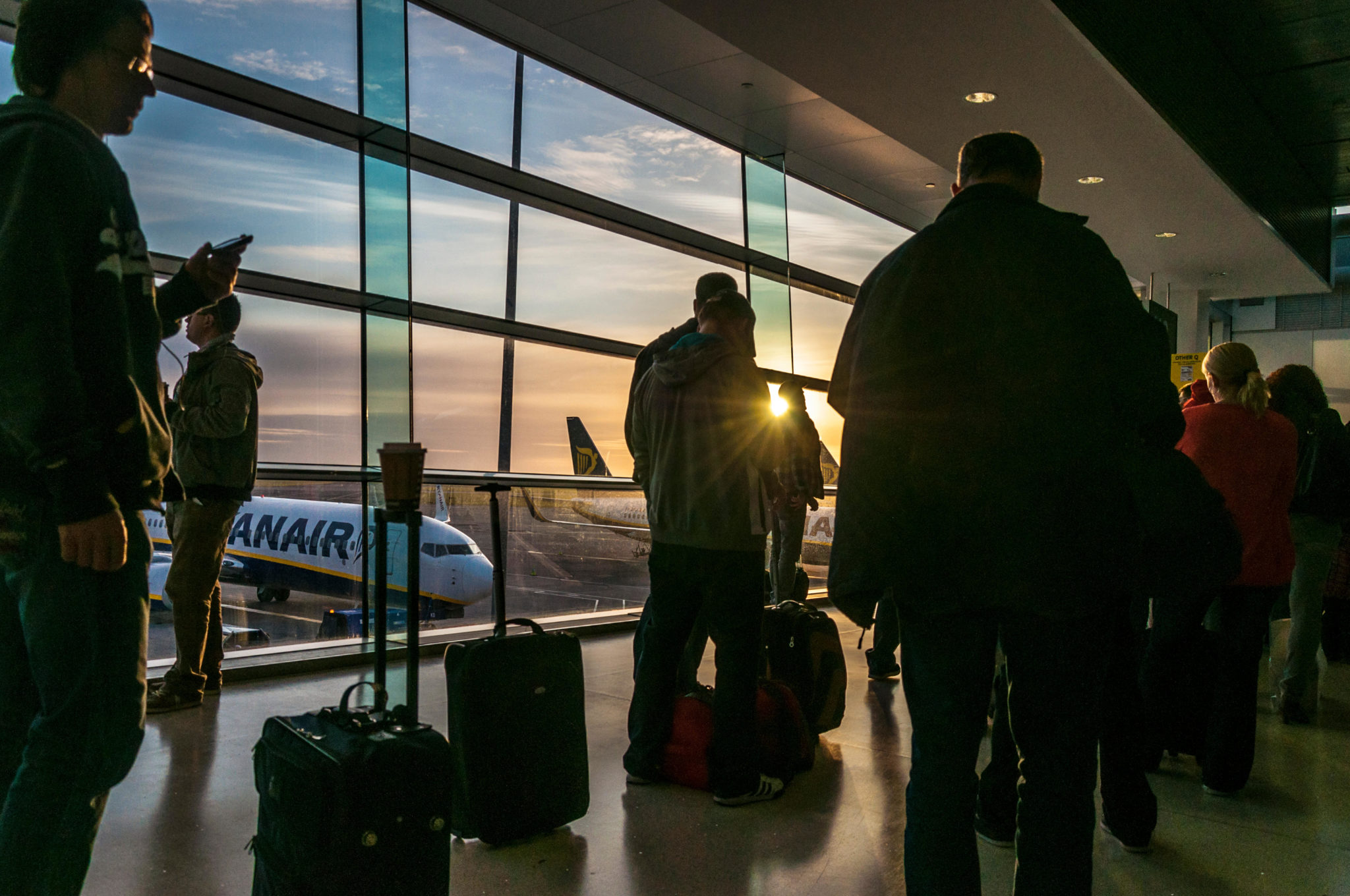 Passengers wait to board an early morning Ryanair flight at Dublin Airport in May 2012.