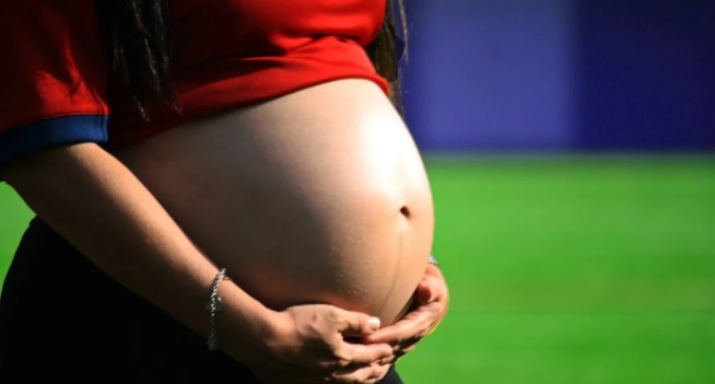 National Maternity Hospital. Image shows a pregnant stomach