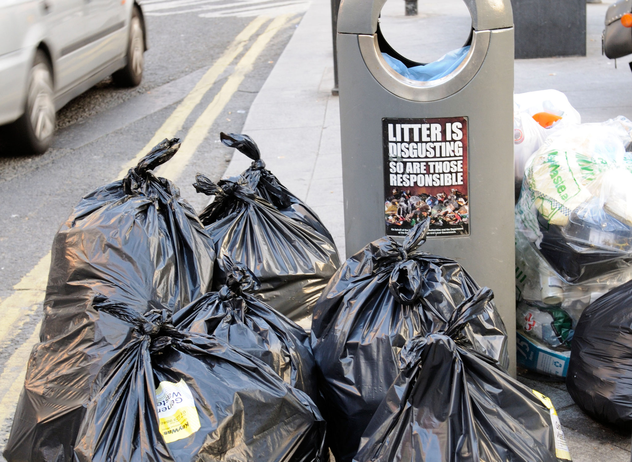 Bin bags await collection in Dublin. Image: Peter Titmuss / Alamy Stock Photo