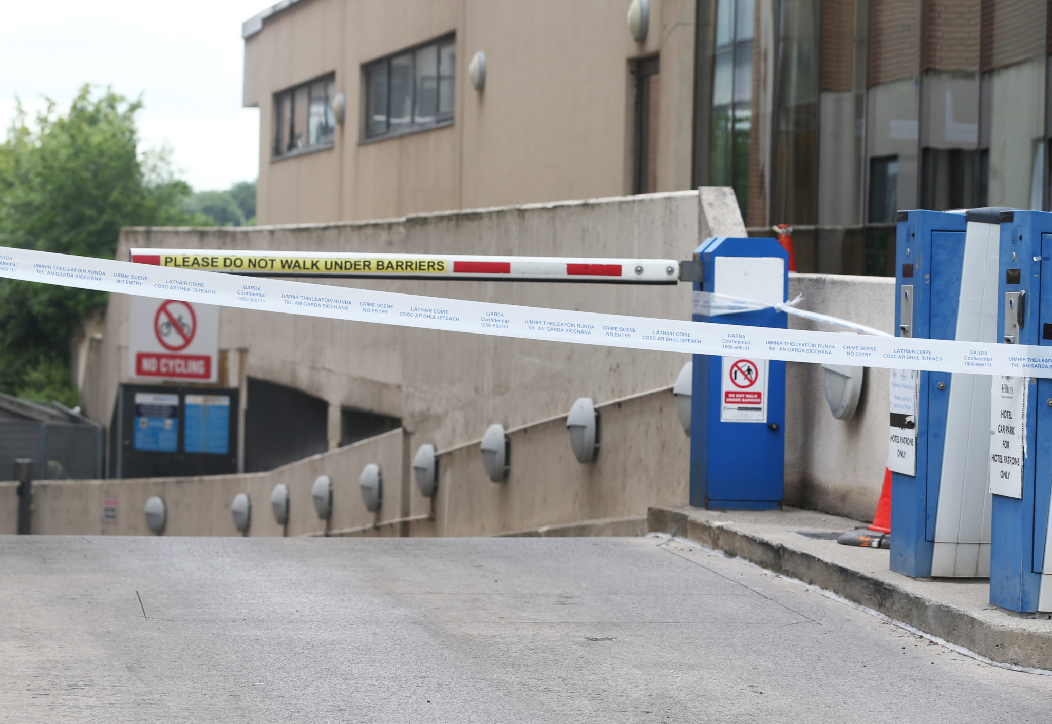 Gardaí at the crime scene outside the Hilton Hotel Kilmainham this afternoon, 24-06-2022. Image: Leah Farrell/RollingNews