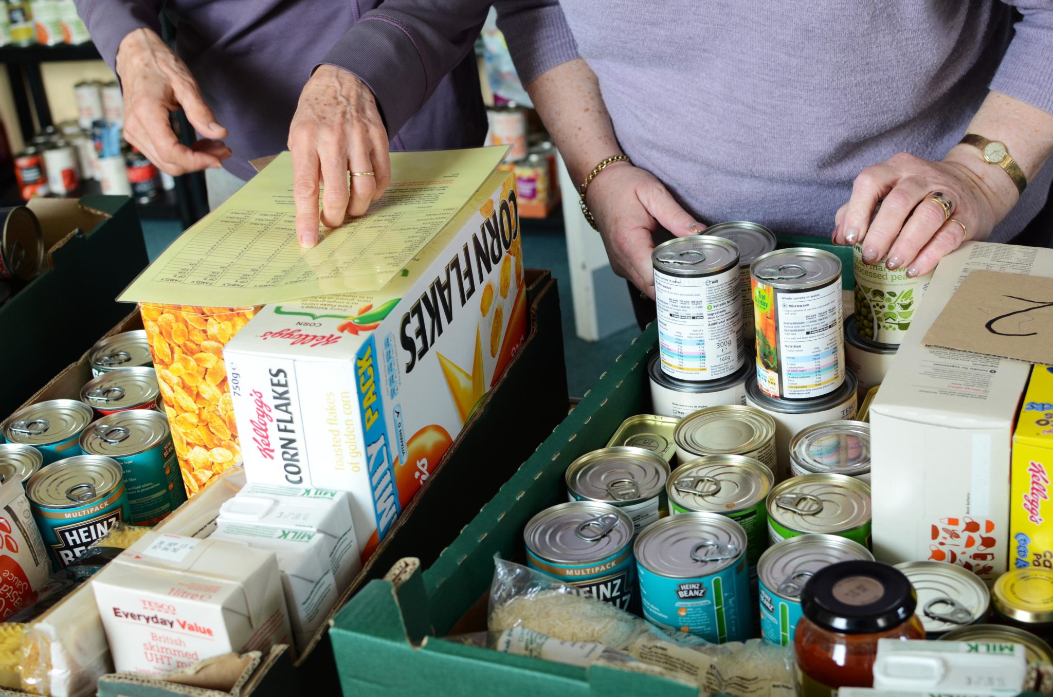 Workers are seen at a food bank in May 2013.
