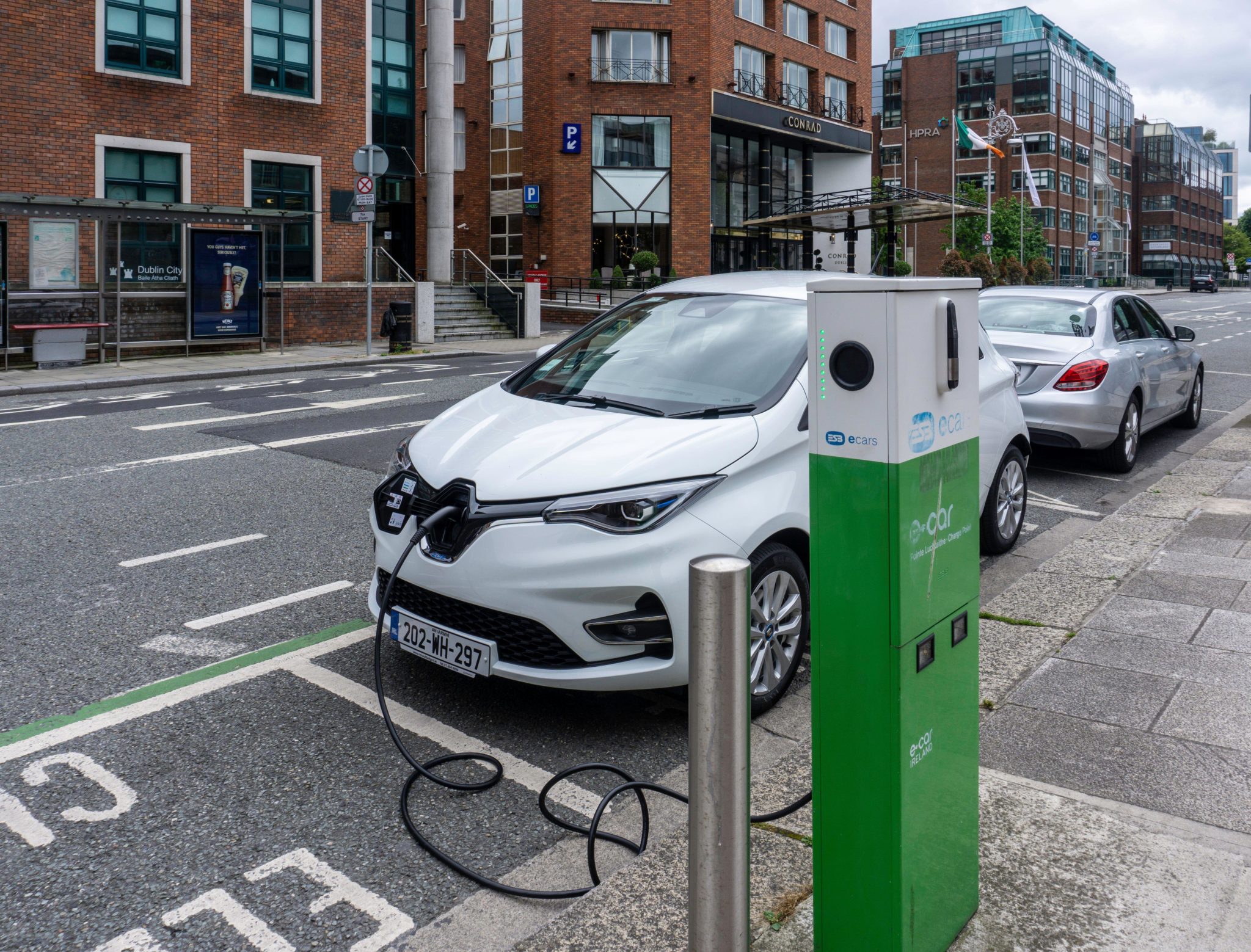 An electric car charging at a charging station in Dublin. Image: noel bennett / Alamy Stock Photo