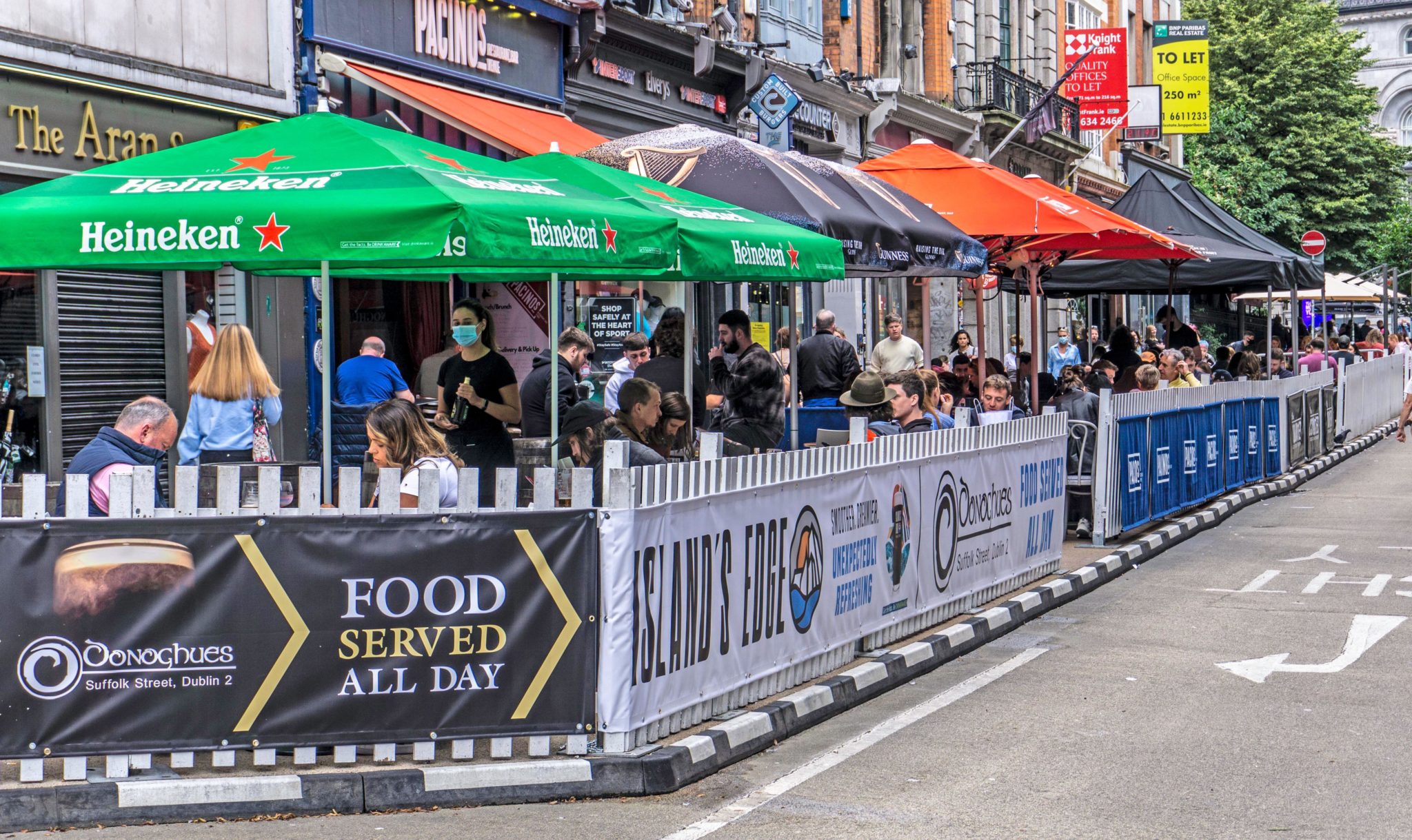 Outdoor dining is seen on Suffolk Street, Dublin in August 2021.