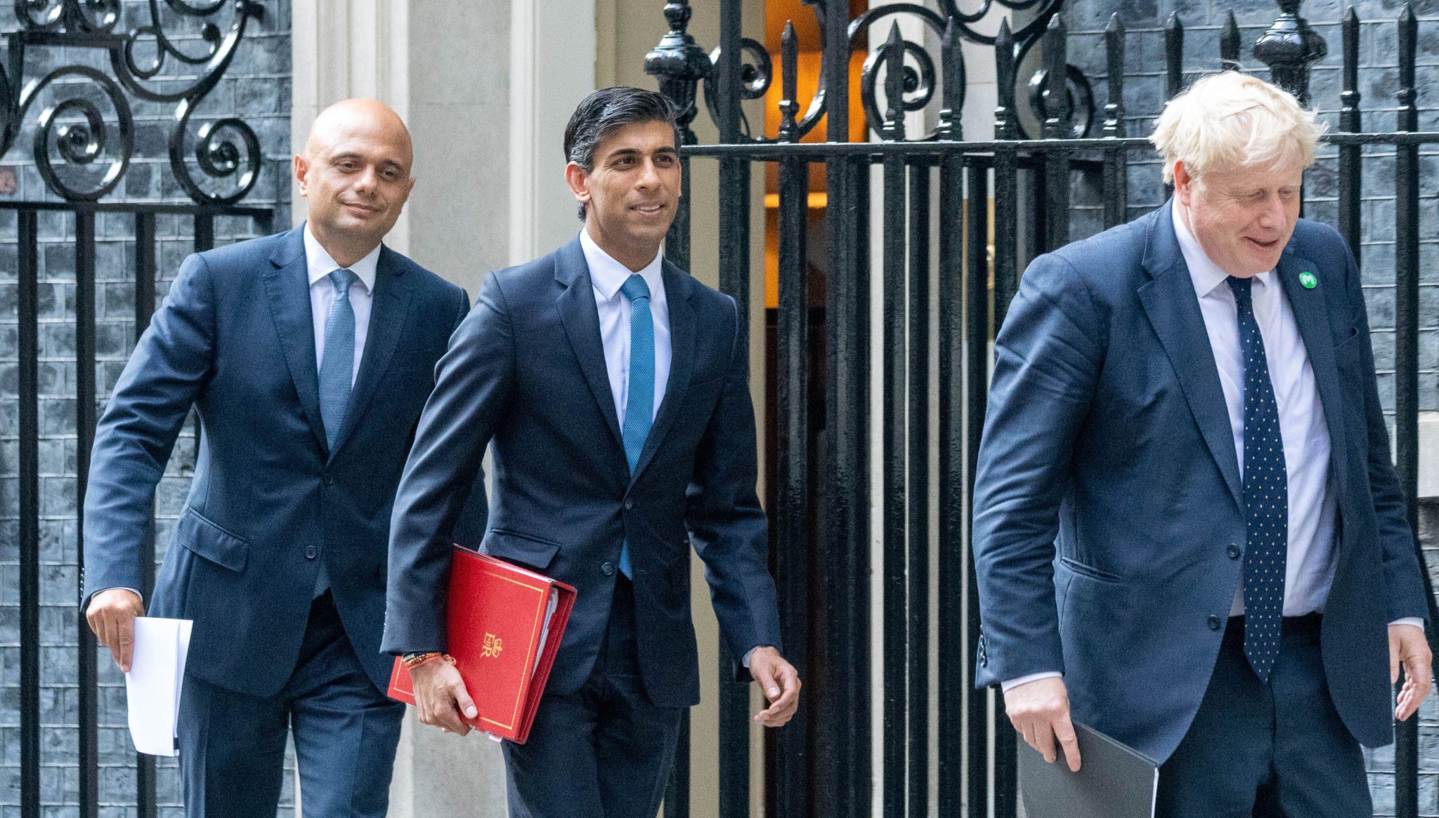 UK Prime Minister Boris Johnson walks away from 10 Downing Street with his Chancellor Rishi Sunak and Health Secretary Sajid Javid in September 2021. Image: Ian Davidson/Alamy Live News