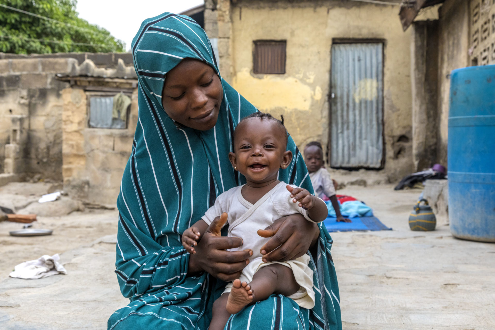 Amina Mohammed with six-month-old Amina Mohammed, who was given the novel oral polio vaccine during an immunisation campaign in Niger in November 2021. 