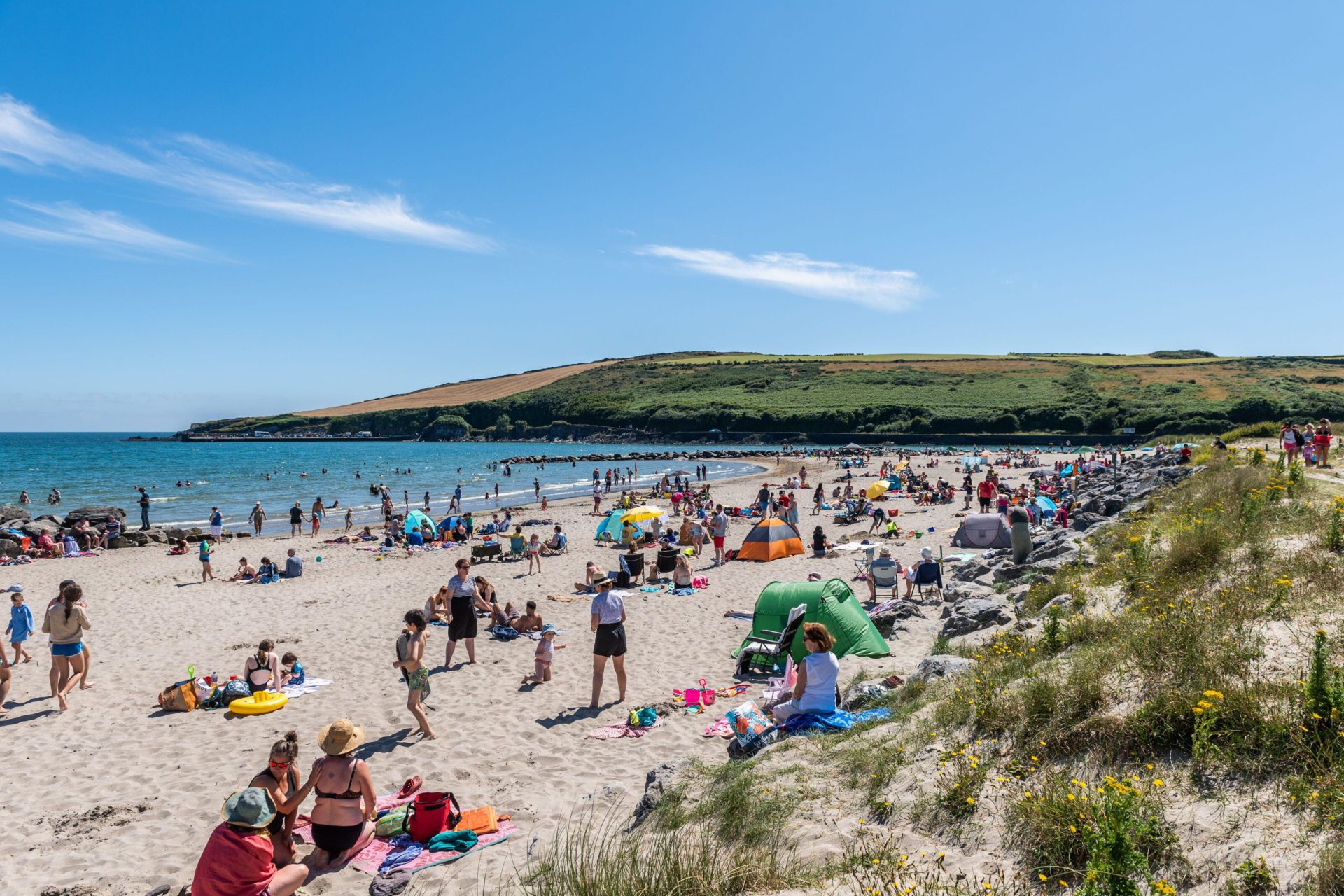 People hit the beach Rosscarbery, West Cork to make the most of the hot weather, 10-07-2022. Image: AG News/Alamy Live News