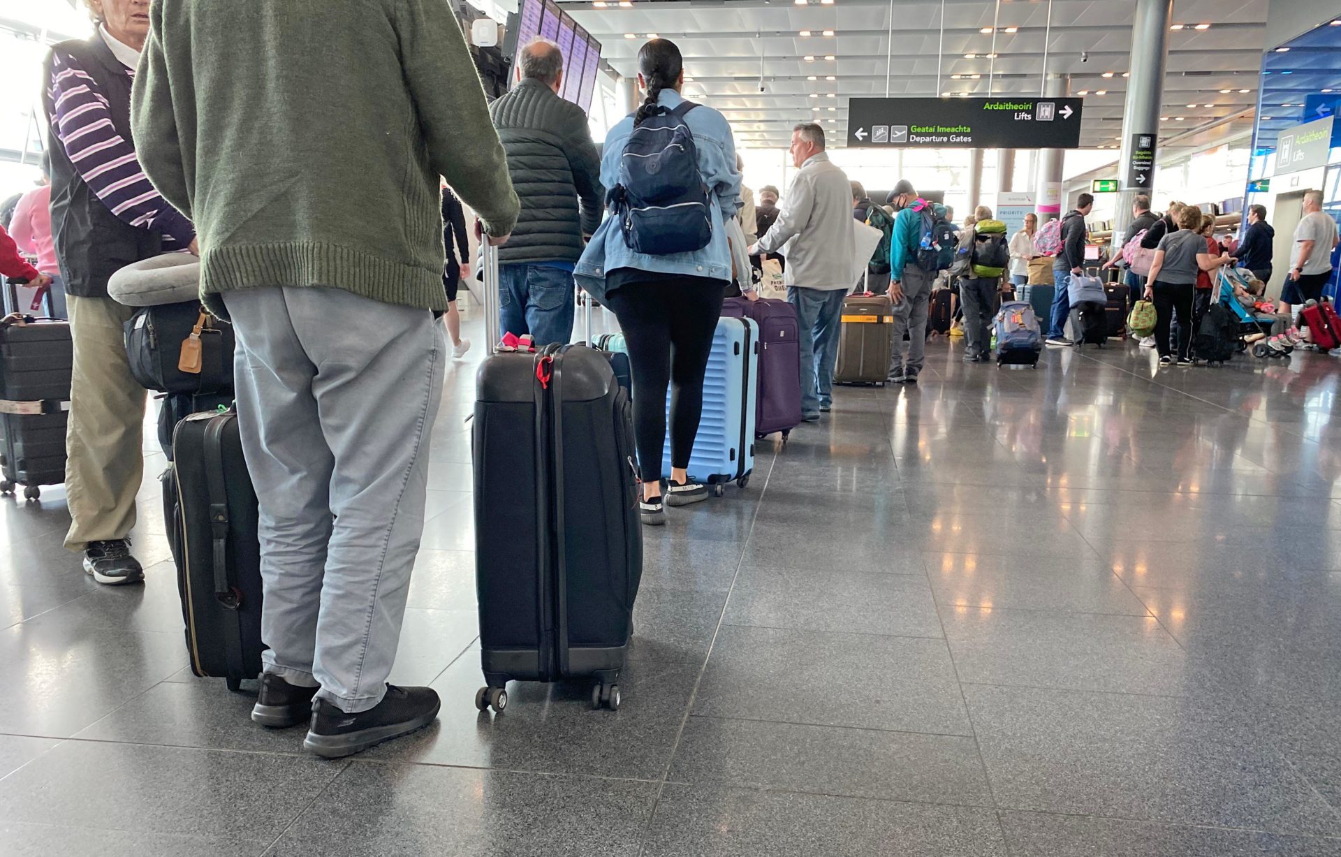 People queue at Dublin Airport in June 2022.