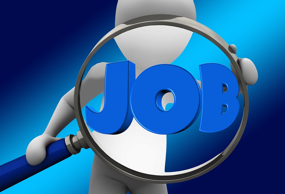 Donegal jobs. Image shows an illustrated character holding up a magnifying glass with the word job written in blue capital letters inside it.