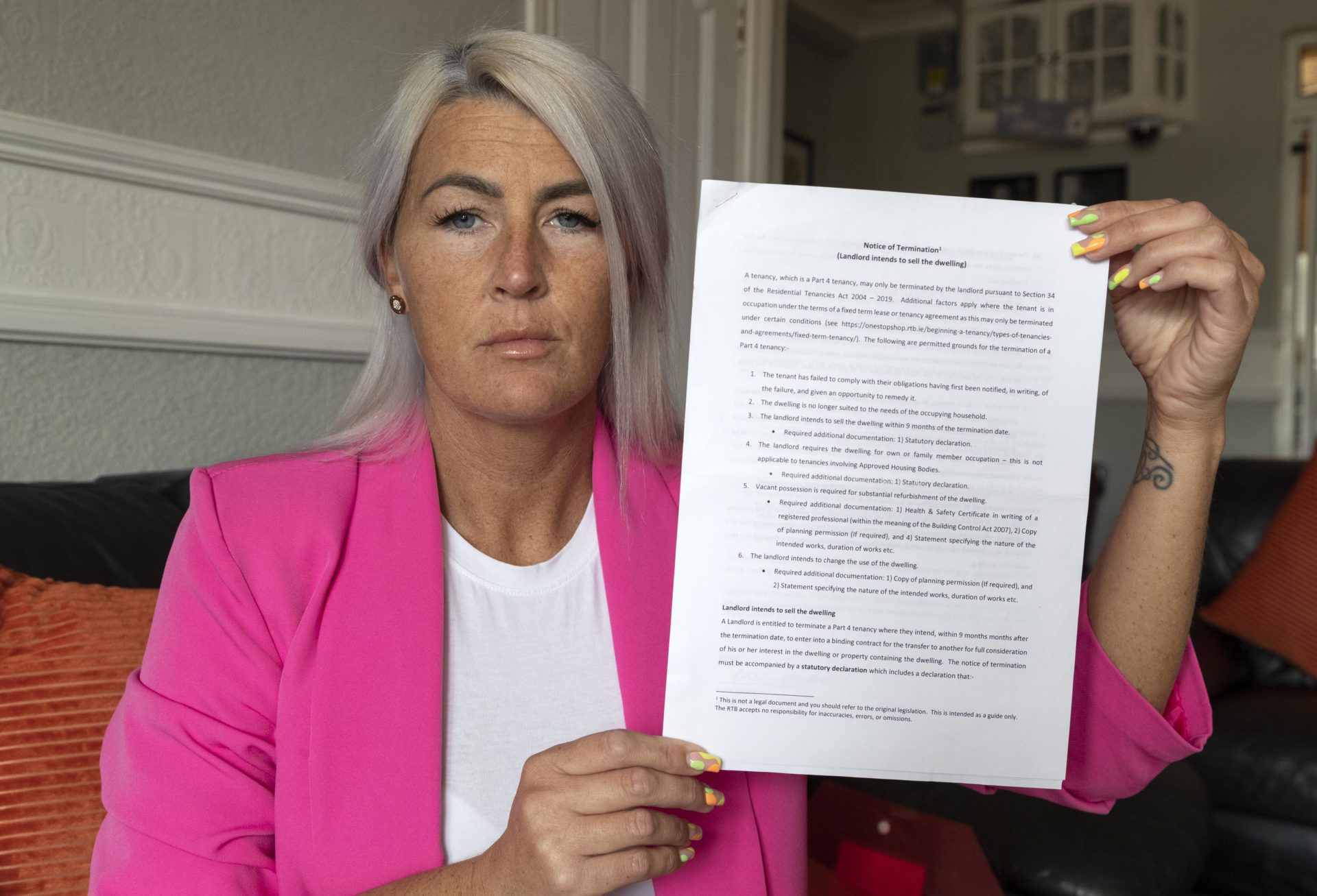 Mother-of-three Natasha White with the Notice of Termination sent to her by her landlord, 27-07-2022. Image: Colin Keegan, Collins Dublin