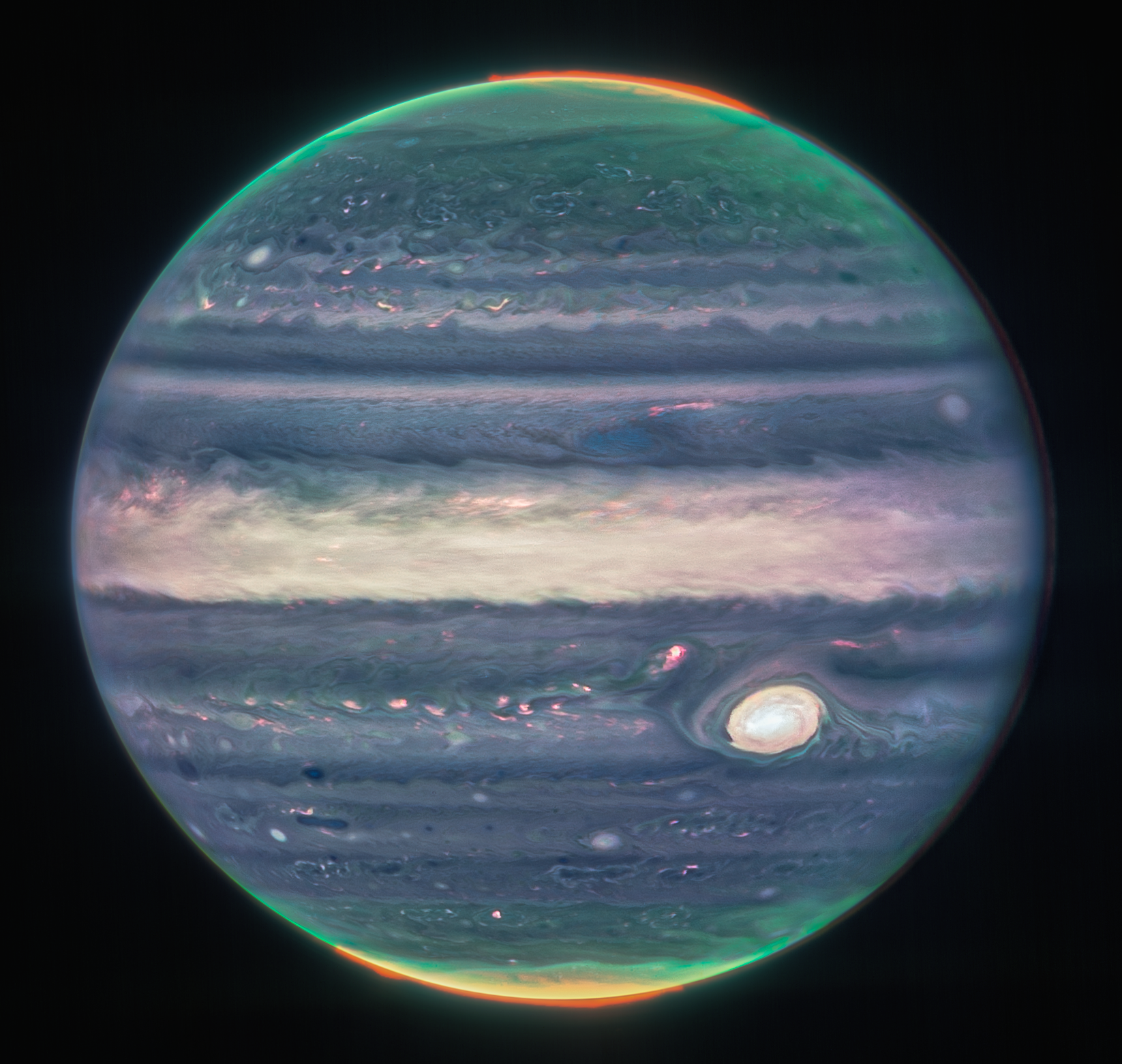 A composite image of Jupiter from three filters – F360M (red), F212N (yellow-green), and F150W2 (cyan).