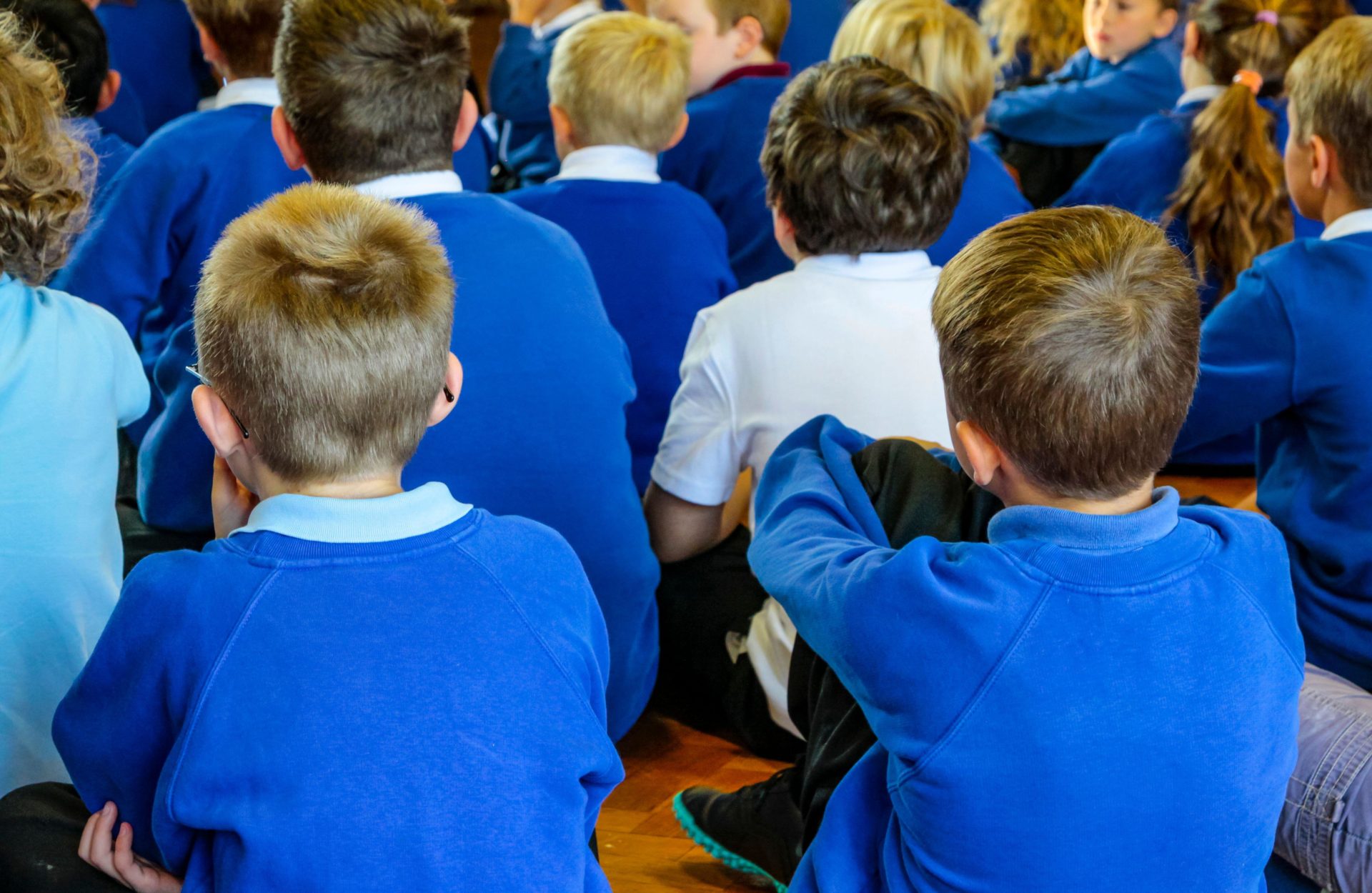 A group of primary school children during a school assembly