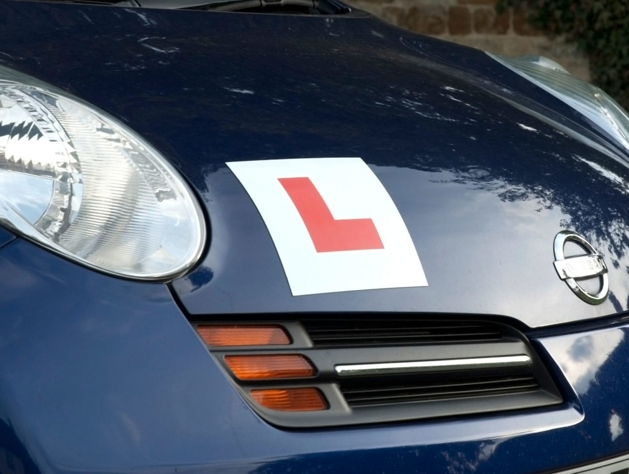 'L' plates on a car for learner drivers