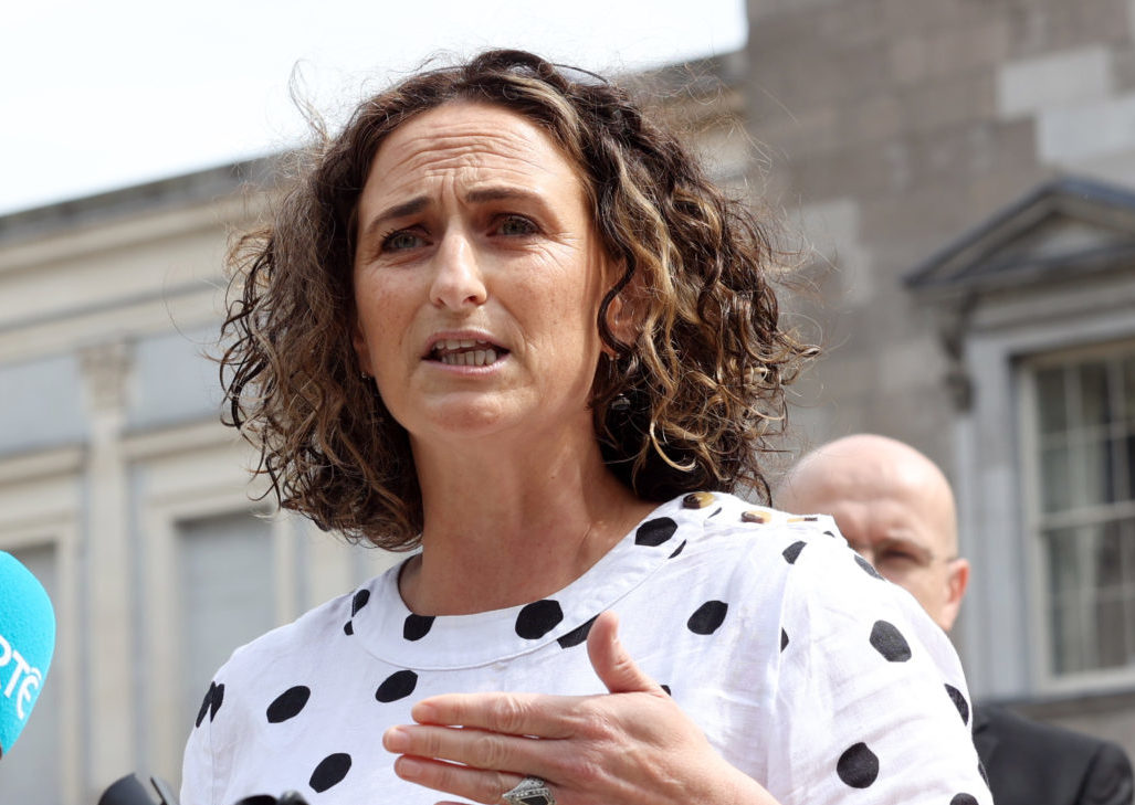 Sinn Féin Senator Lynn Boylan talking to the media on the plinth at Leinster House in August 2021.