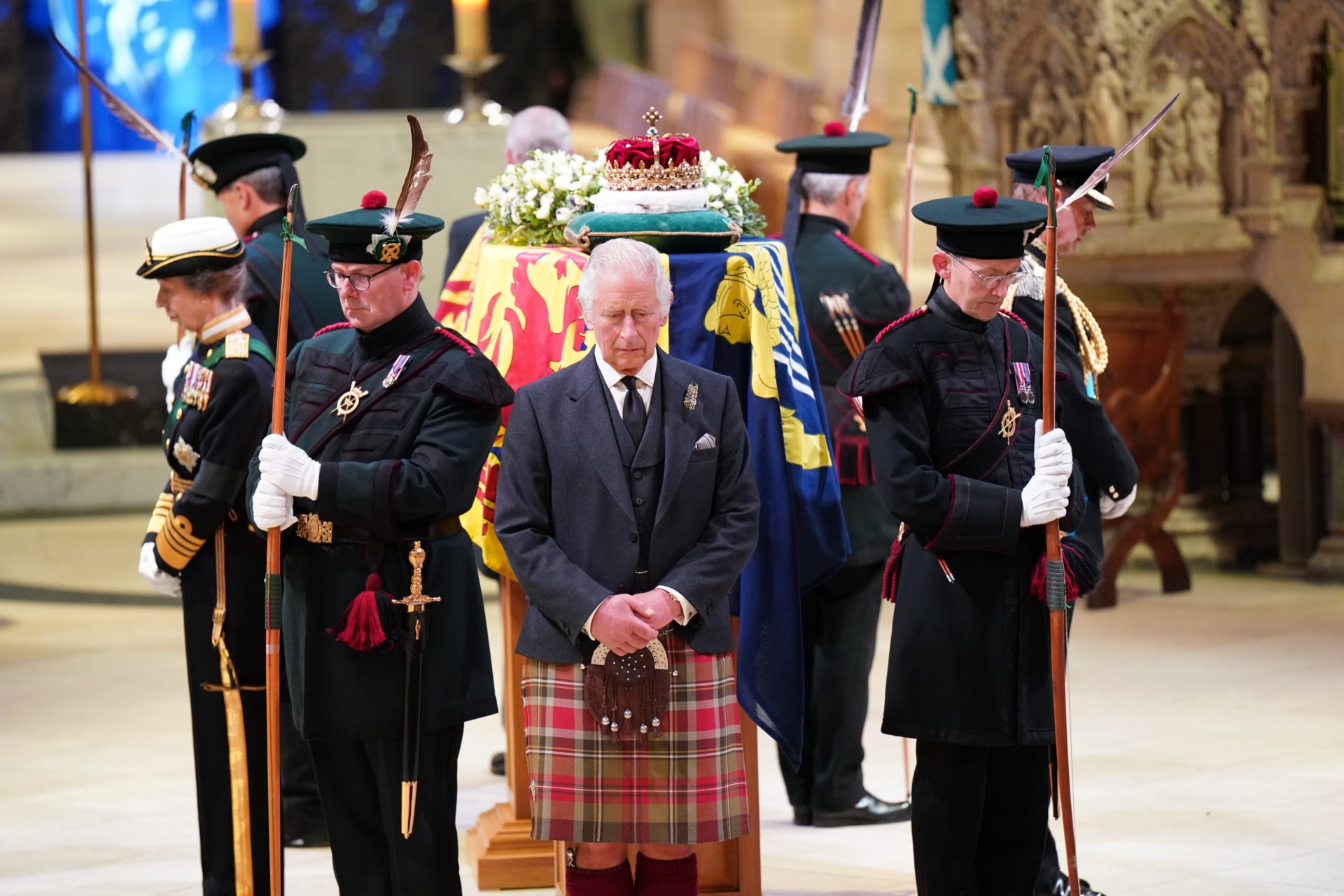 Members of the British royal family stand watch beside Queen Elizabeth II's coffin in St Giles' Cathedral in Edinburgh, Scotland. 