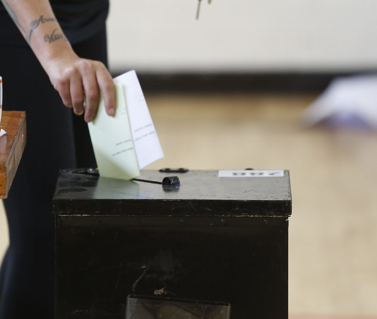 A woman votes at a ballot box in Dublin in 2015.