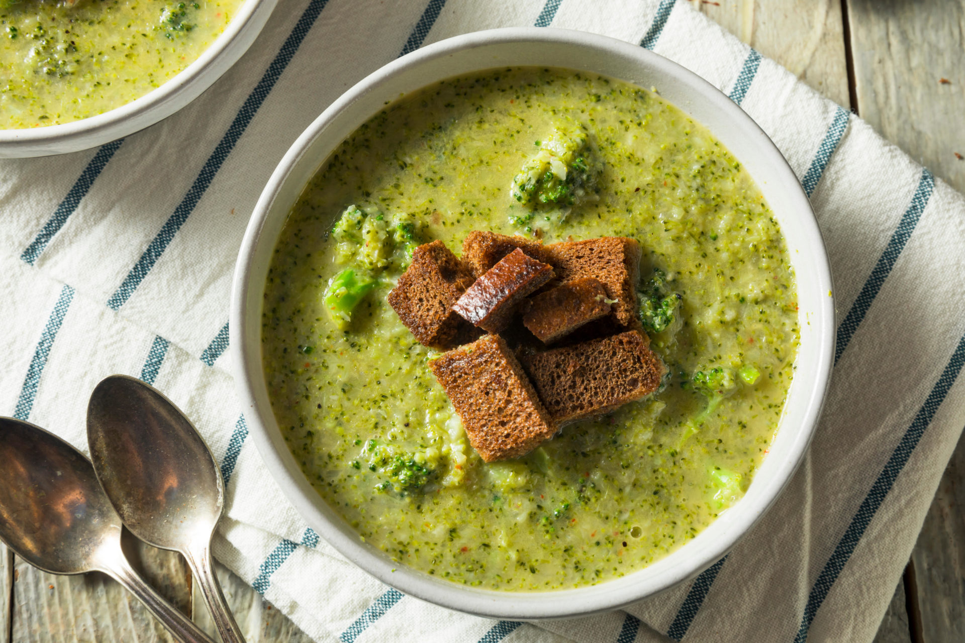 Homemade Organic Broccoli Soup with Rye Bread Croutons. Image