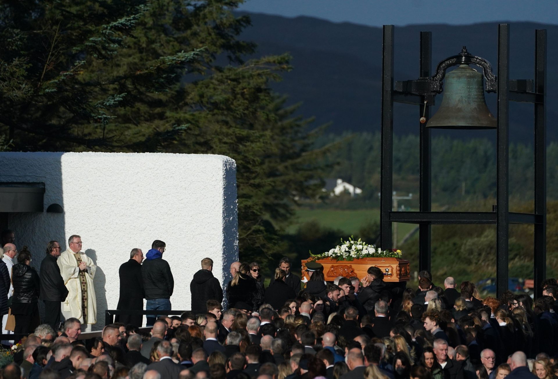 The coffin of Martina Martin is carried into St Michael's Church, in Creeslough.