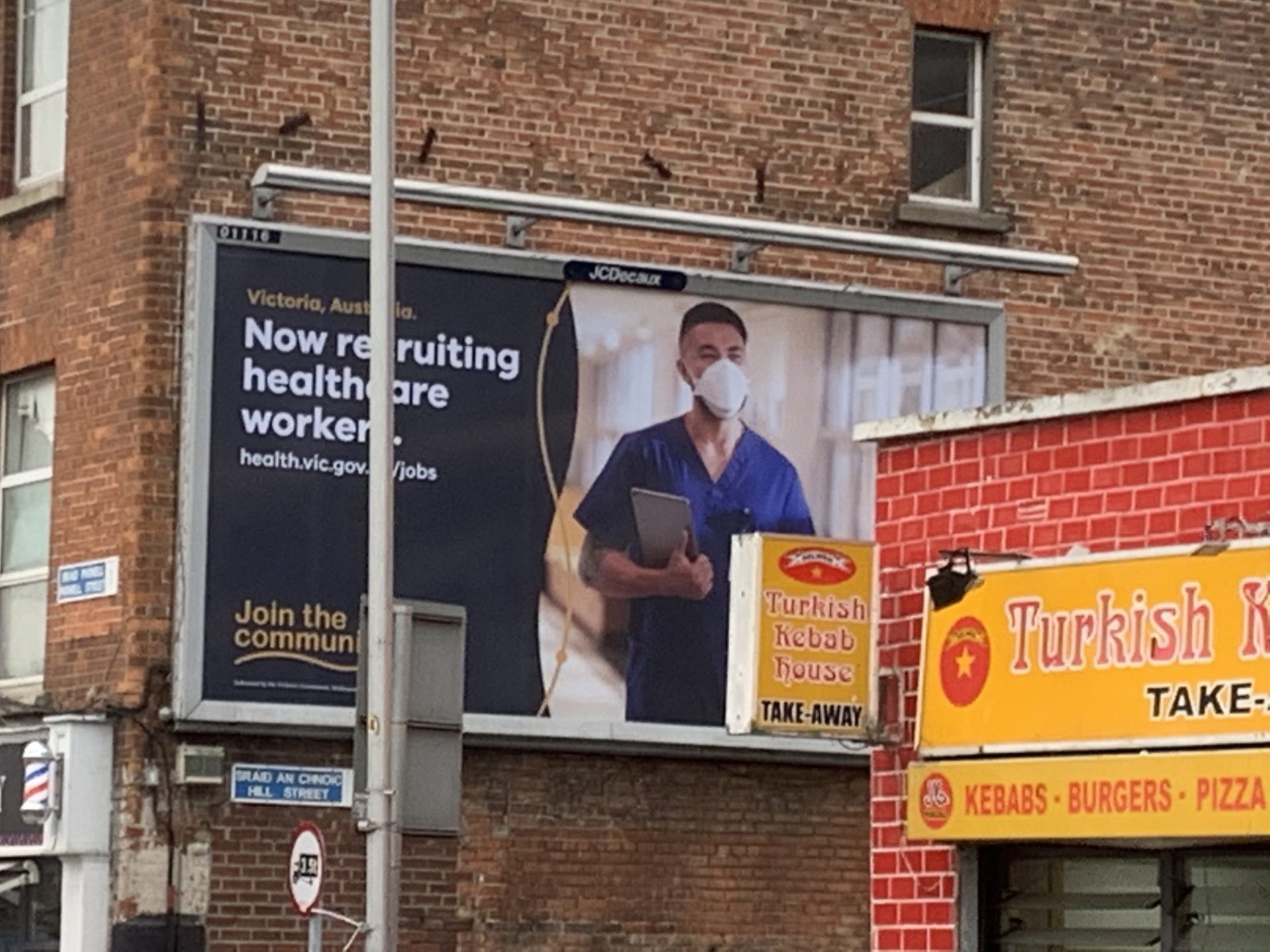 An Australian recruitment billboard is seen in Dublin city