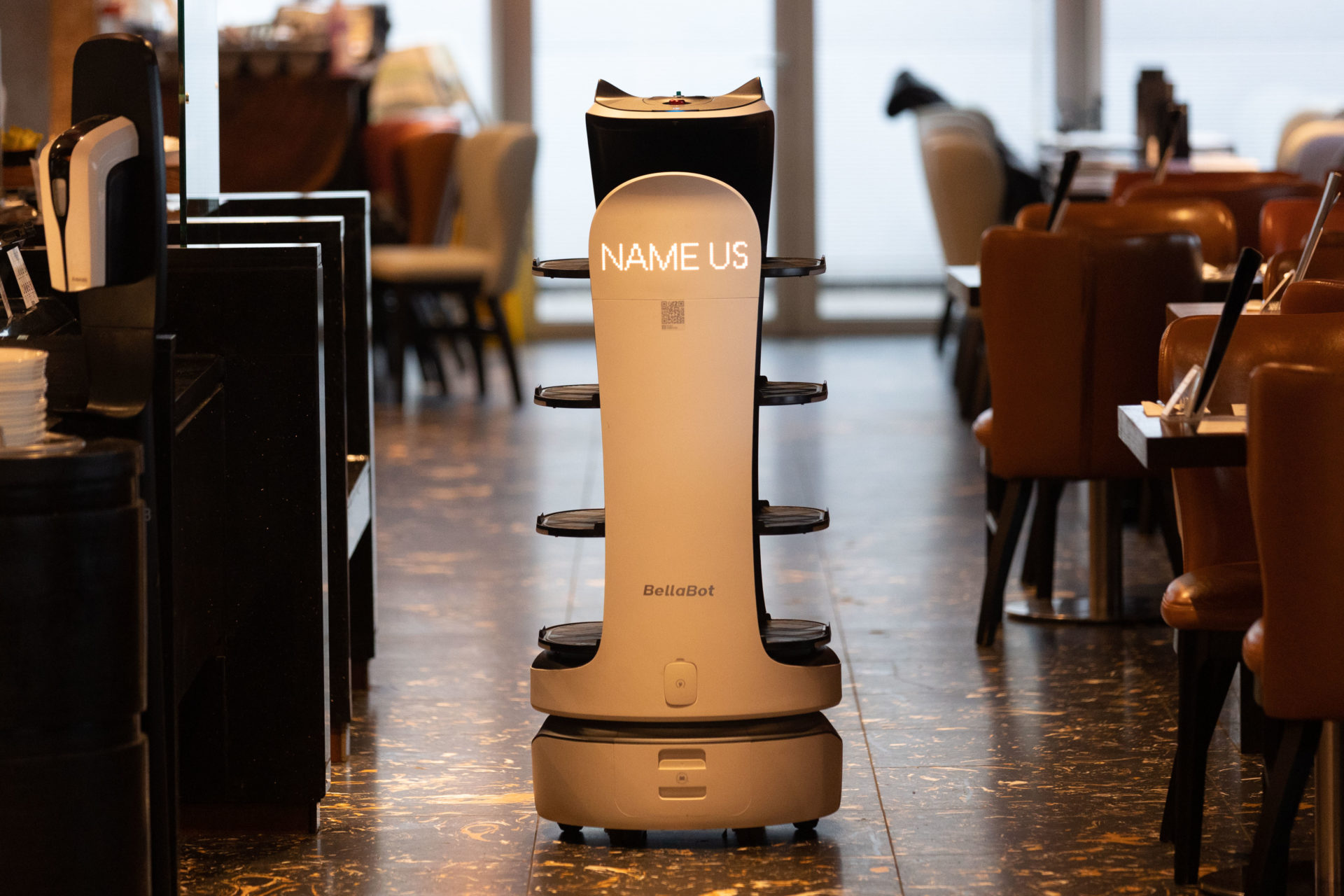 A robot waiters at work in COSMO restaurant at Liffey Valley in Dublin.