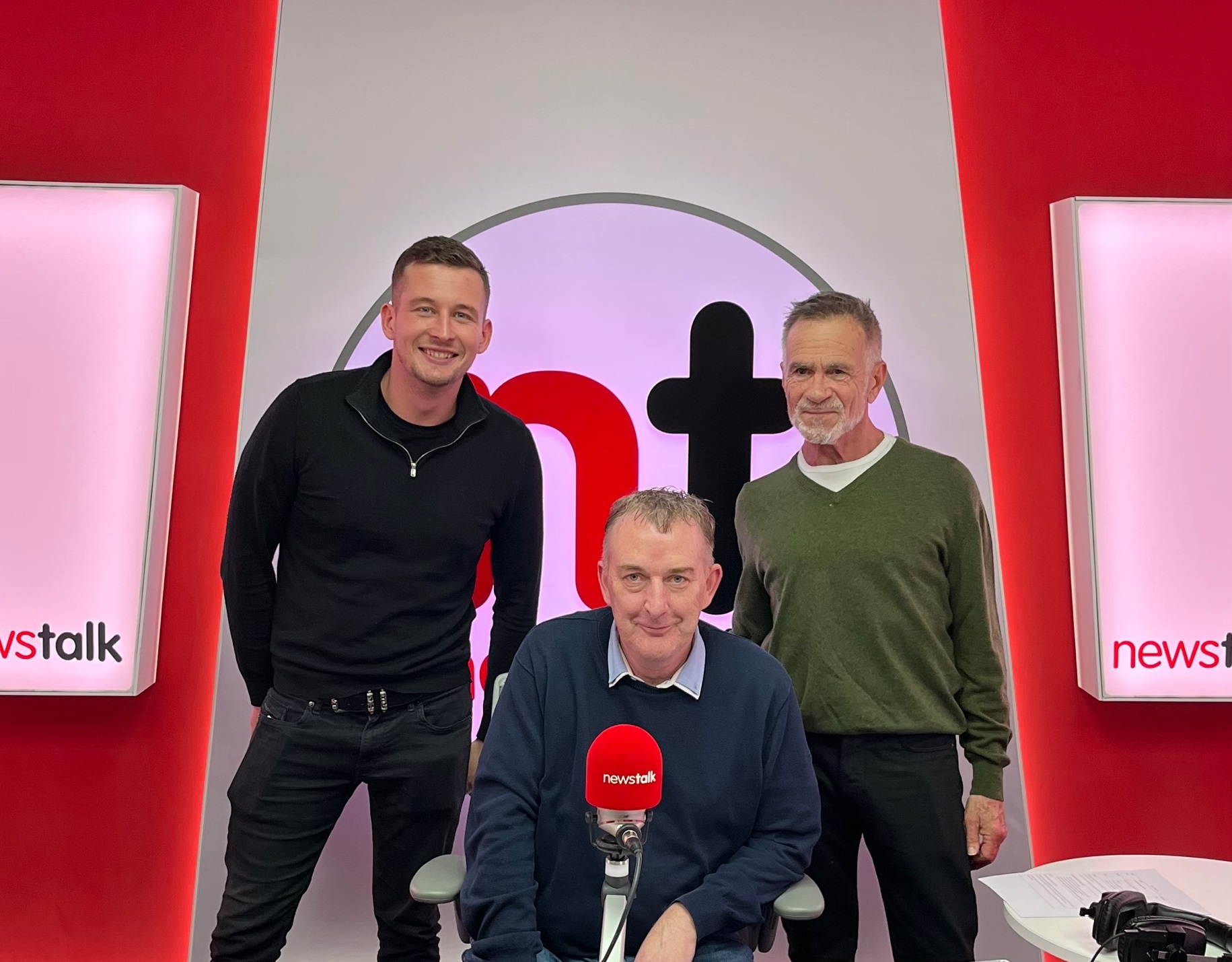Aaron and Michael in Newstalk studios with presenter Adrian Kennedy.