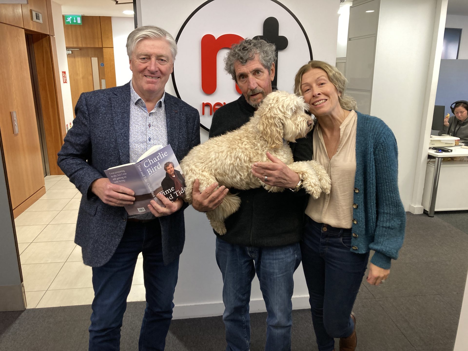 Pat Kenny, Charlie Bird, with Tiger, and his wife Claire in Newstalk studios in Dublin
