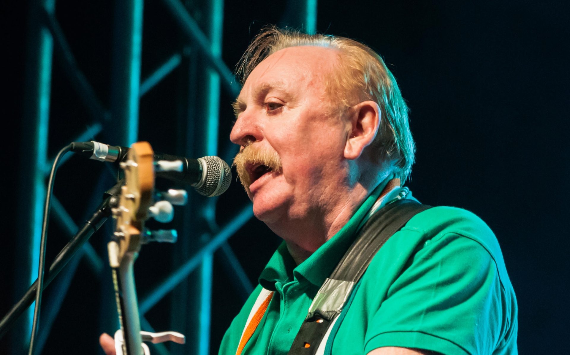 Brian Warfield from 'The Wolfe Tones' performs in Belfast, Northern Ireland in August 2015