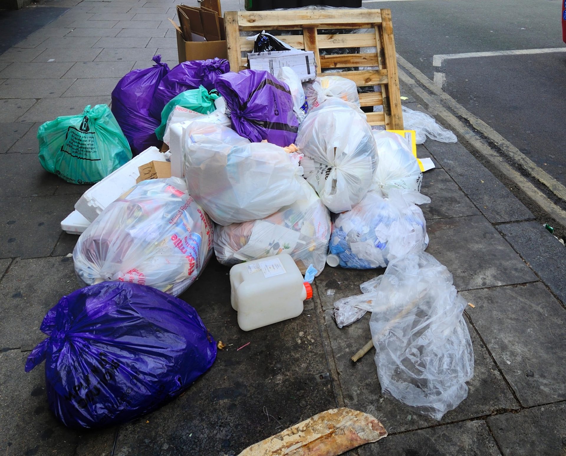 File photo shows a pile of rubbish bags.