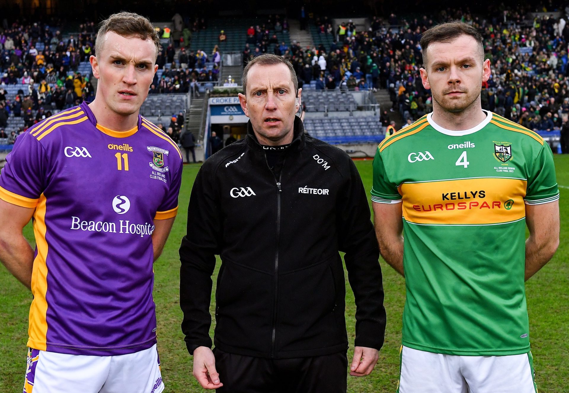 Referee Derek O'Mahoney with team captains Shane Cunningham of Kilmacud Crokes and Connor Carville of Watty Graham's Glen before the AIB GAA Football All-Ireland Senior Club Championship Final match at Croke Park. 