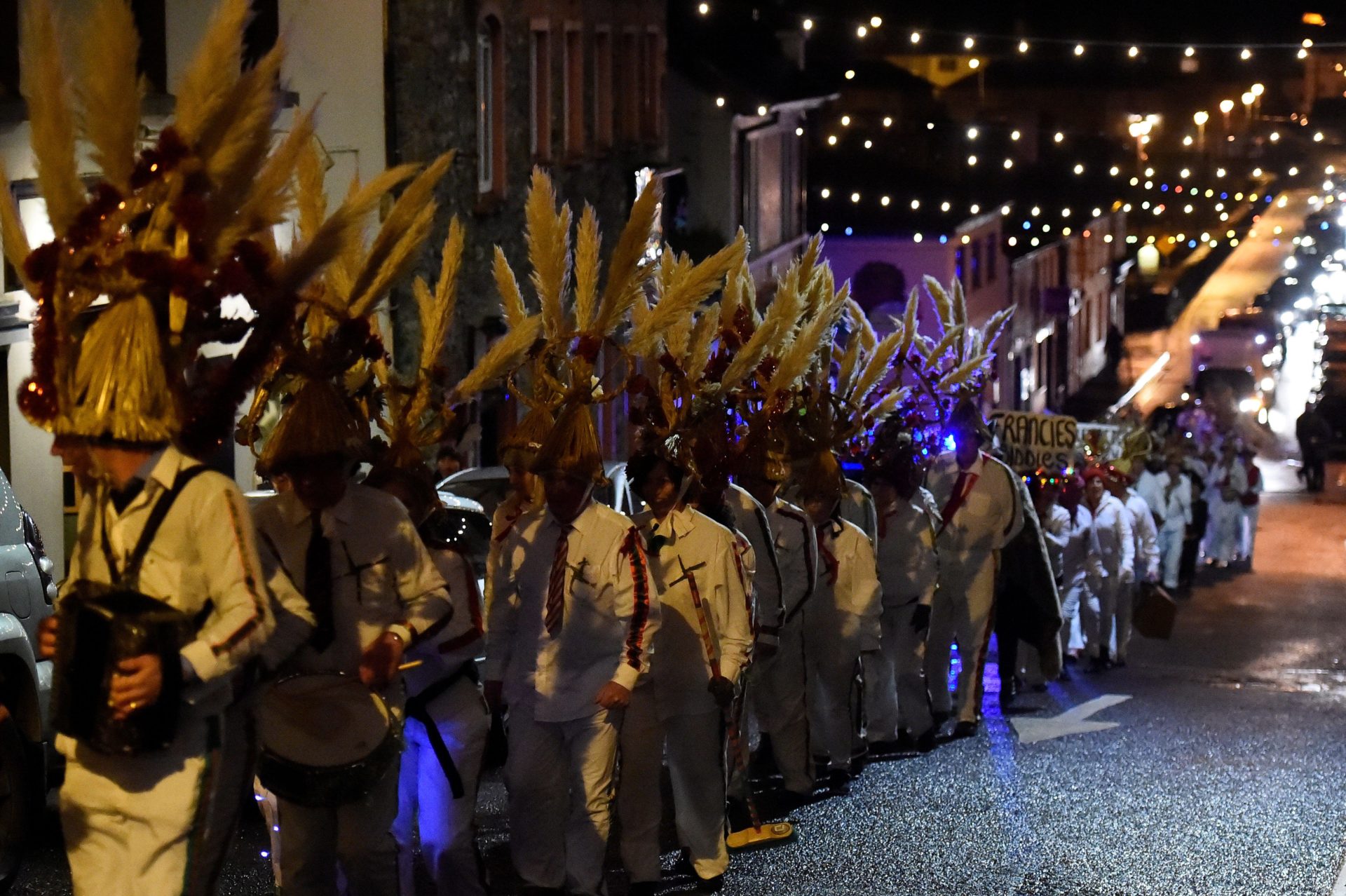 Biddy's groups parade through the streets to celebrate the Celtic festival of Imbolc, in Killorglin, Ireland.