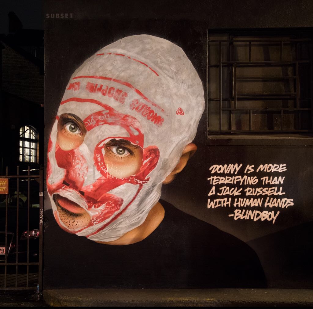A mural by Subset depicting The Rubberbandits is seen in Dublin city