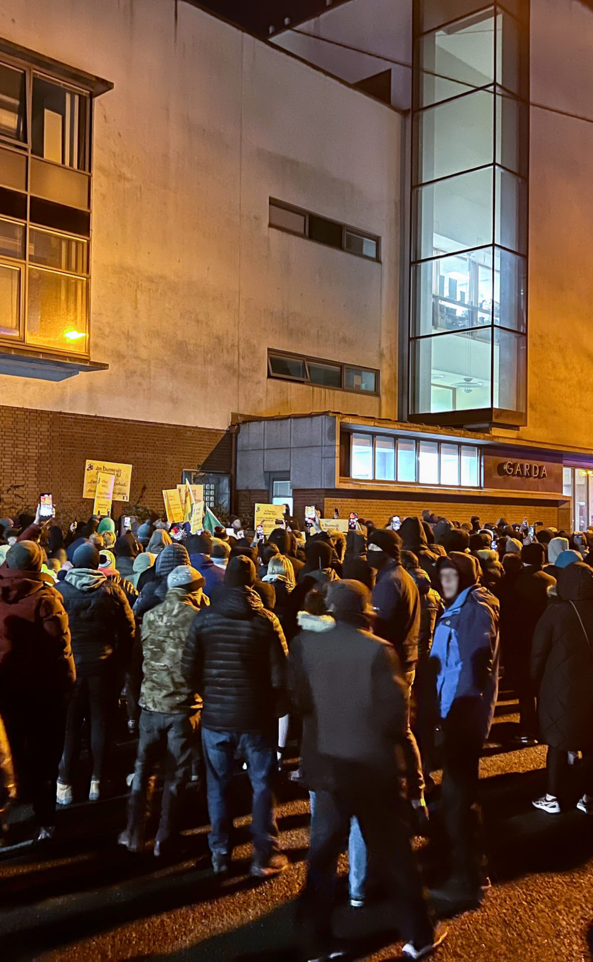 Protesters outside Finglas Garda Station.